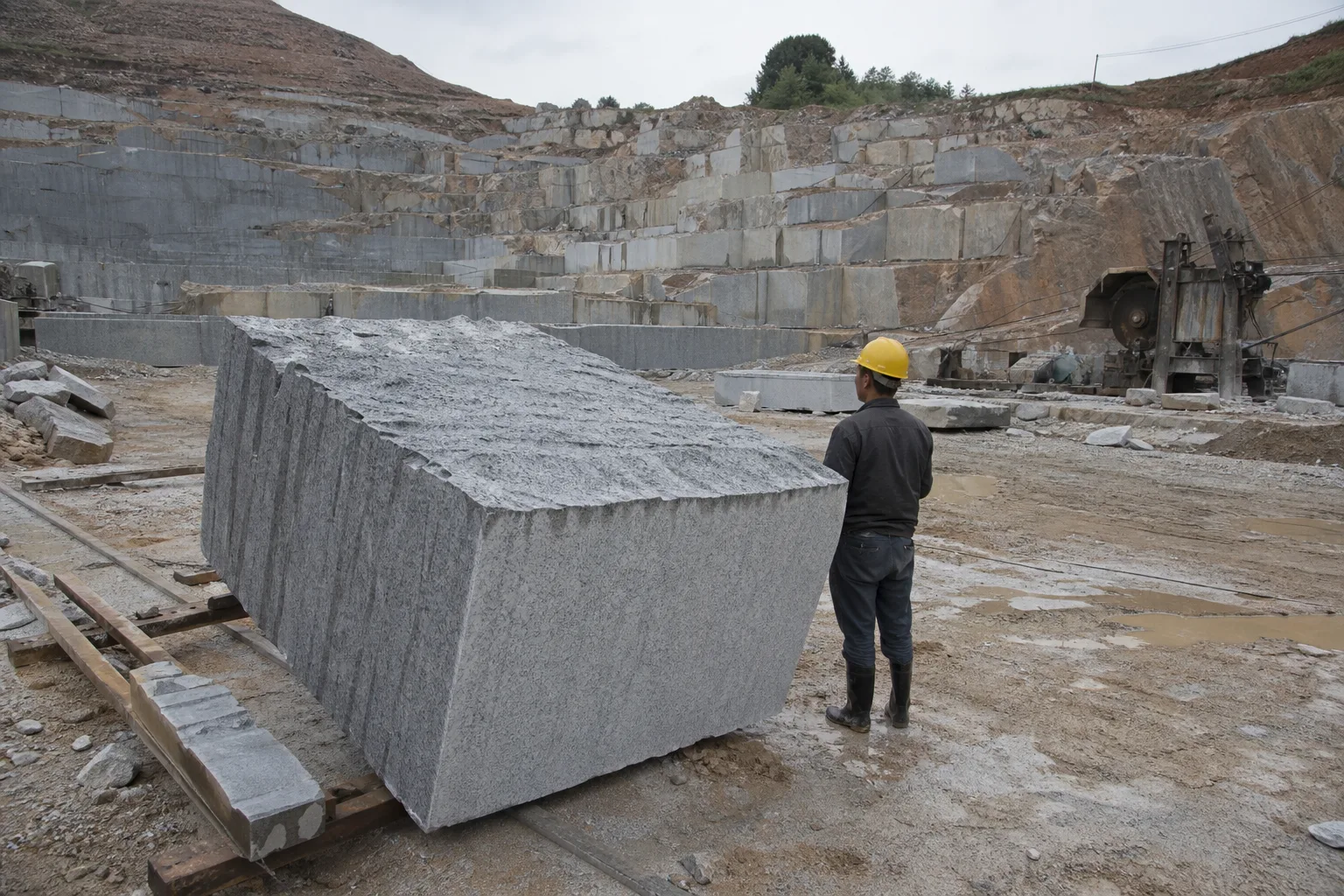 Granite blocks and cut slabs arranged at a Chinese stone yard
